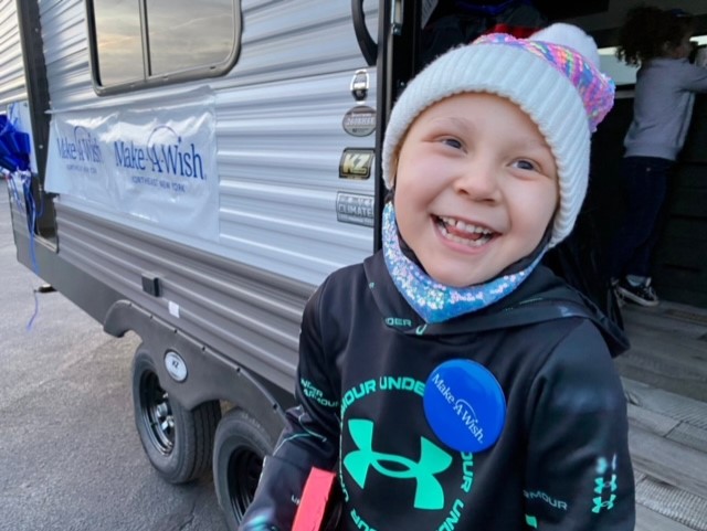 Amelia next to her new 2022 Sportsmen 260BHSE