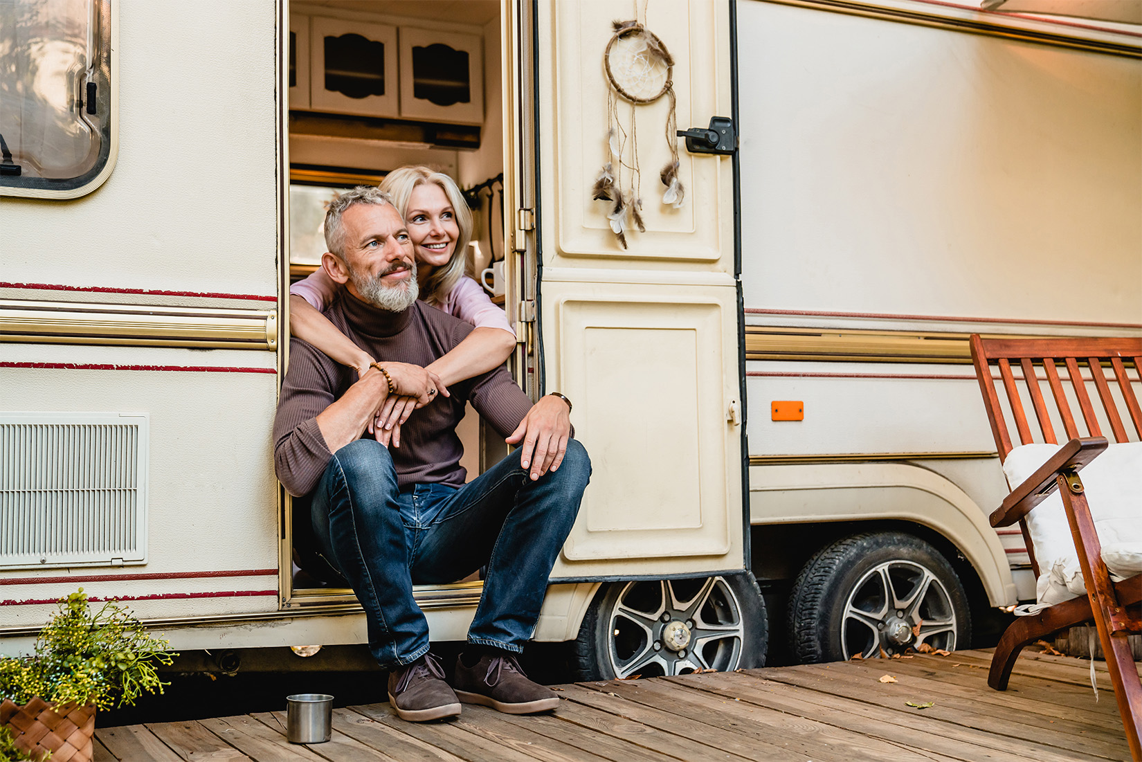 WhatYourRVSaysAboutYou-couple-1 | I Heart RVing RV couple inside door of RV