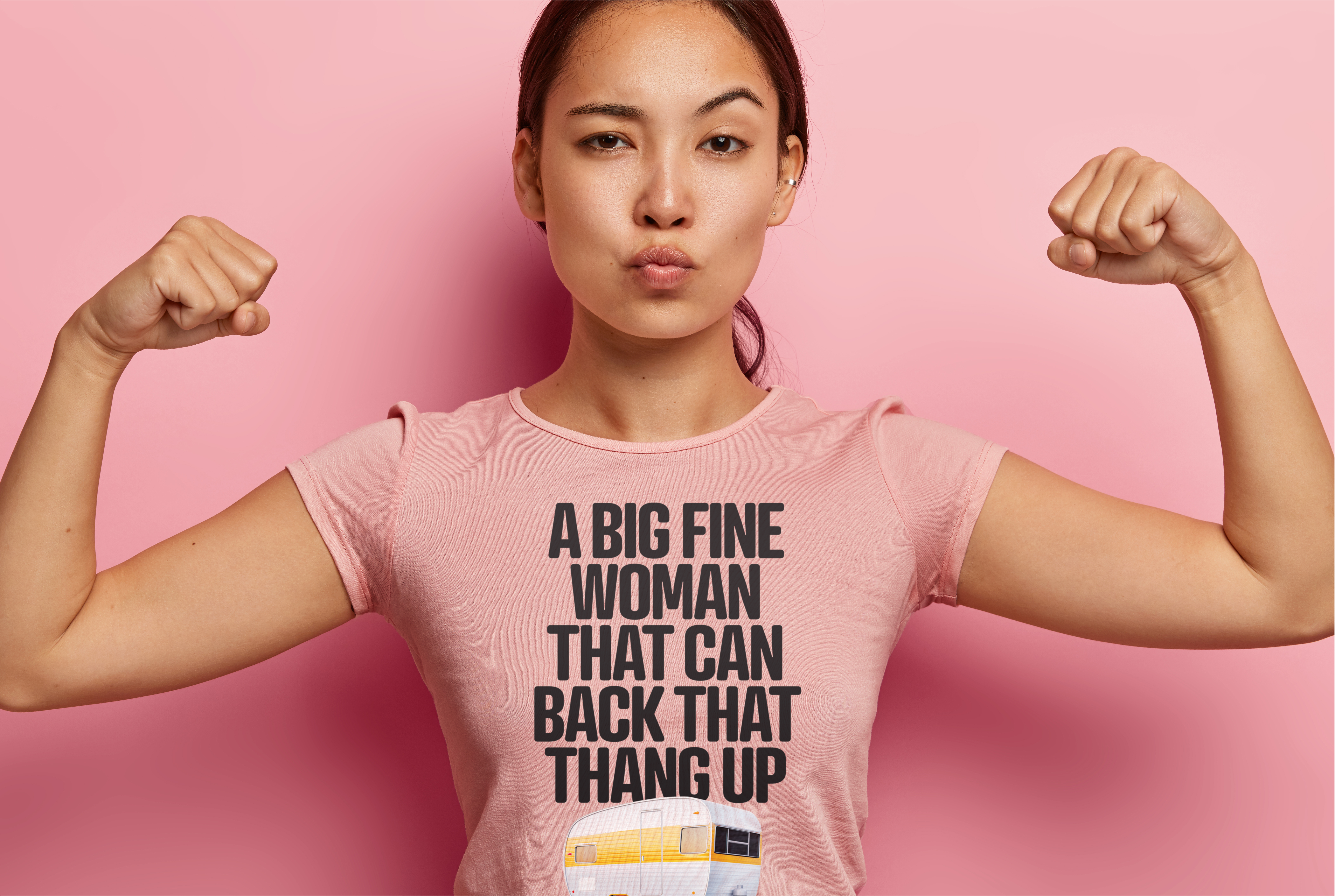 woman flexing against pink background