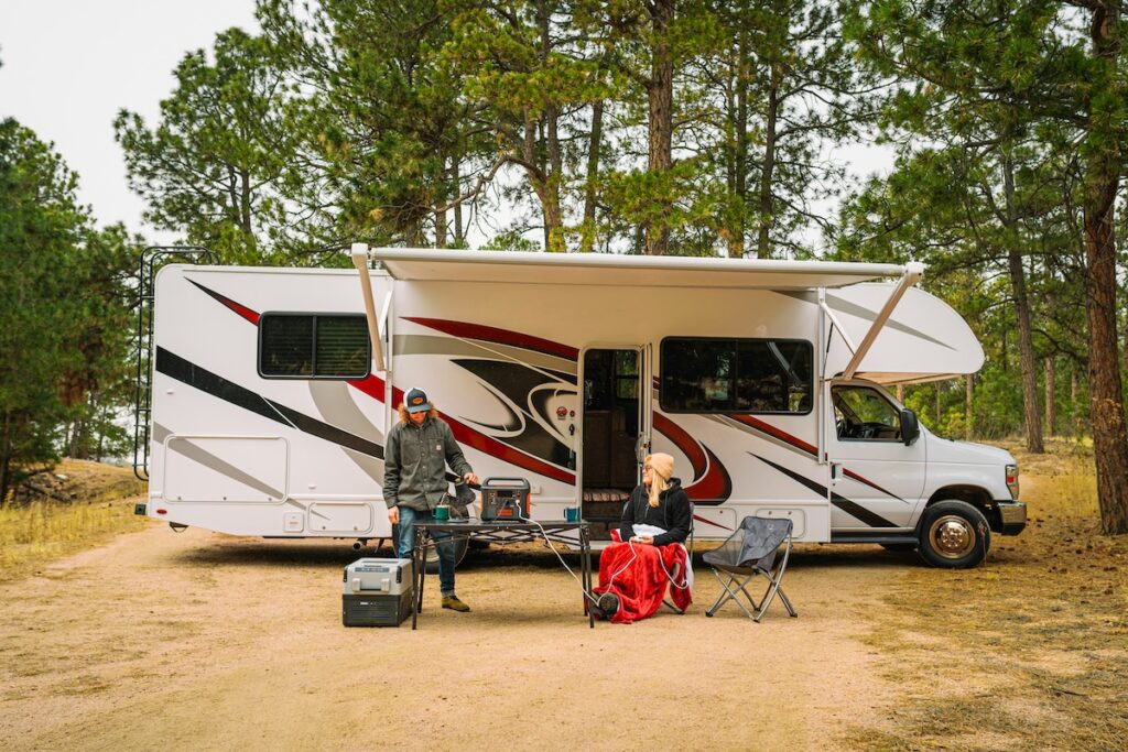 A portable power station setup outside a motorhome