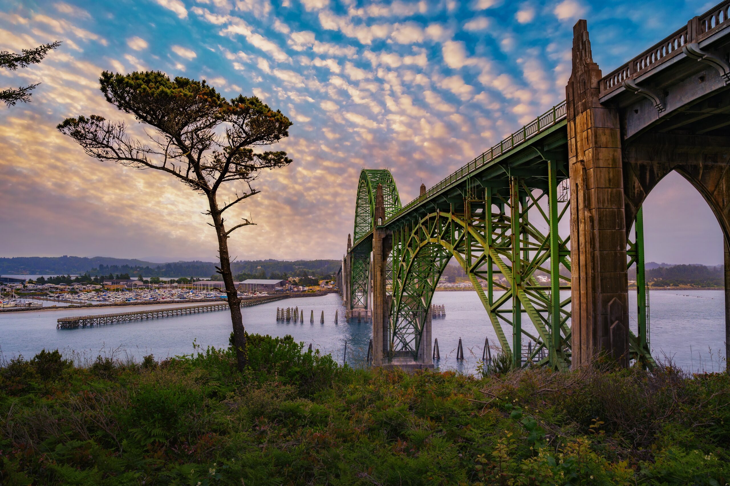 SunsetOverYaquinaBayBridgeInNewportOregonWithCloudy | I Heart RVing
