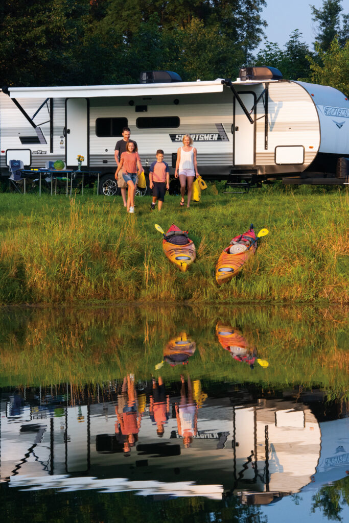 2022-KZ-RV-Sportsmen-SE-281BHSE-Travel-Trailer-at-Lakeside-Campground-with-Family-HR-1 | I Heart RVing