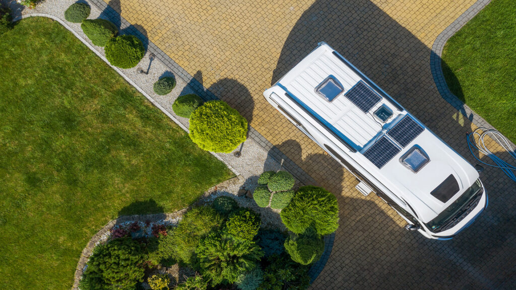 CampingAndTourismThemeModernCamperVanWithSolarPanels | I Heart RVing RV in the driveway
